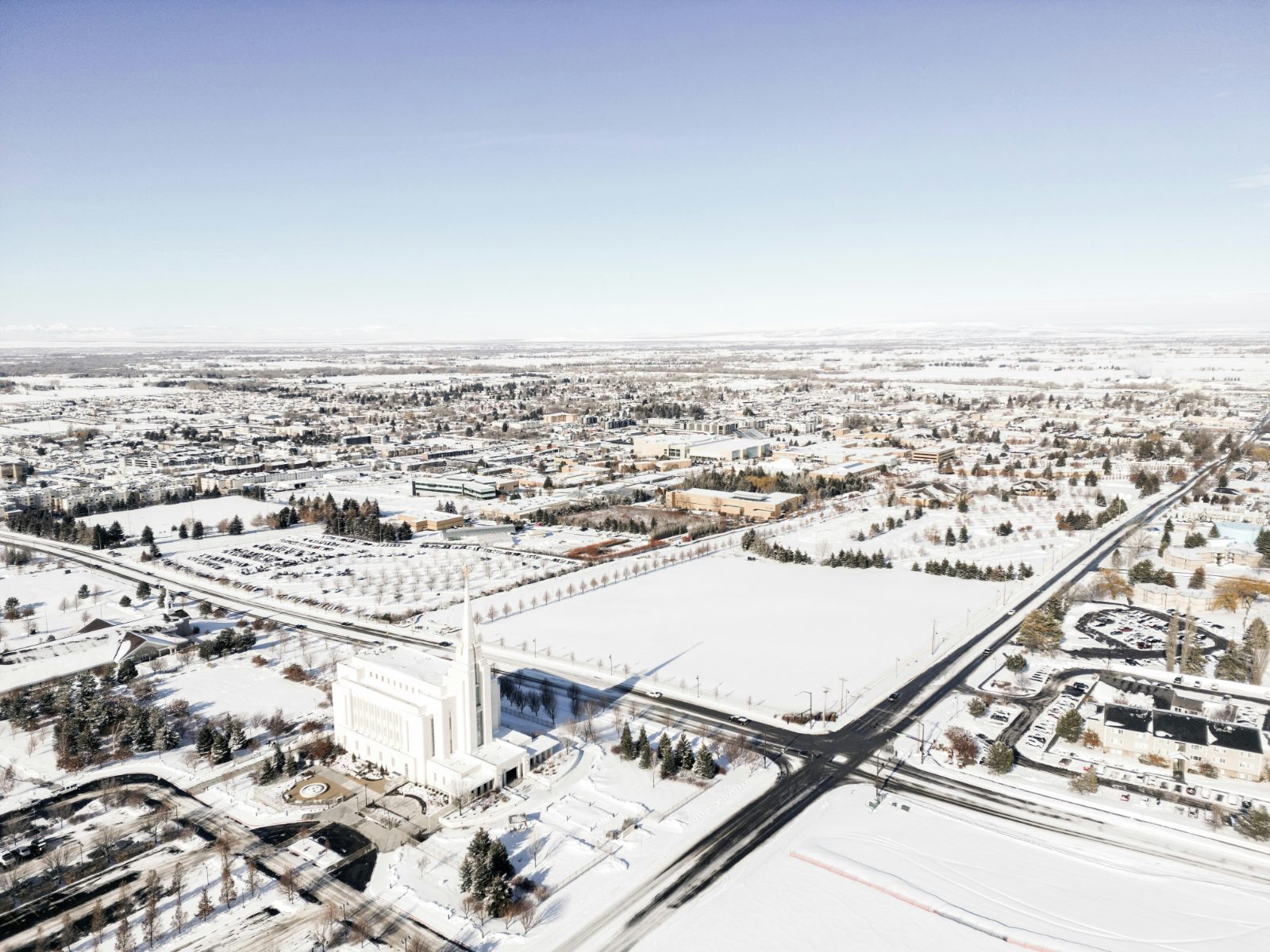 Aerial view of Rexburg, Idaho under winter snow